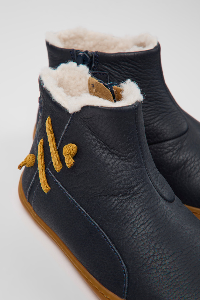 Close-up view of Peu Navy blue leather ankle boots