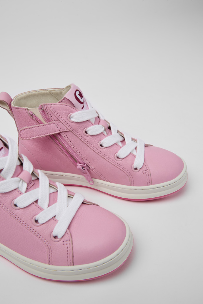 Close-up view of Runner Pink leather high-top sneakers for kids