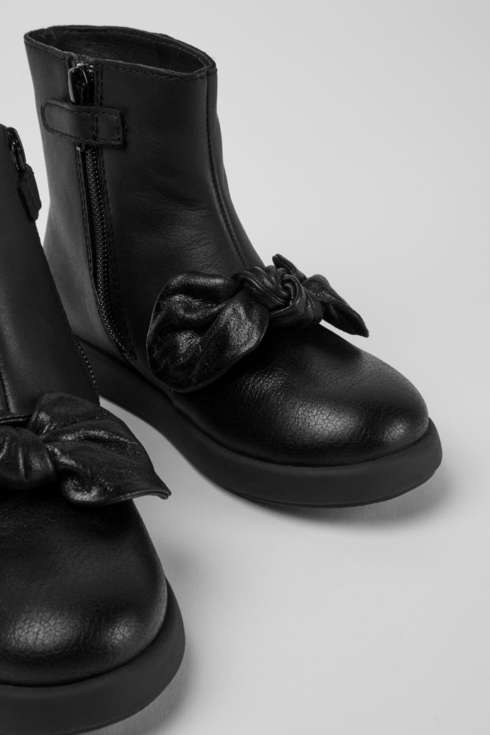Close-up view of Duet Black leather ankle boots