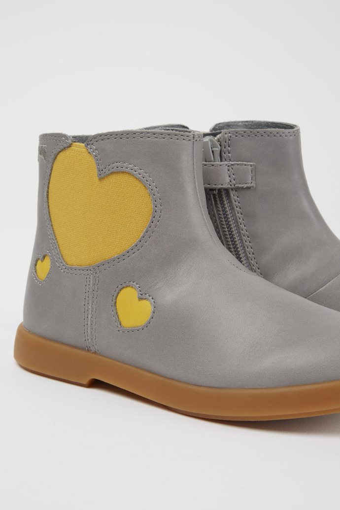 Close-up view of Duet Gray leather ankle boots