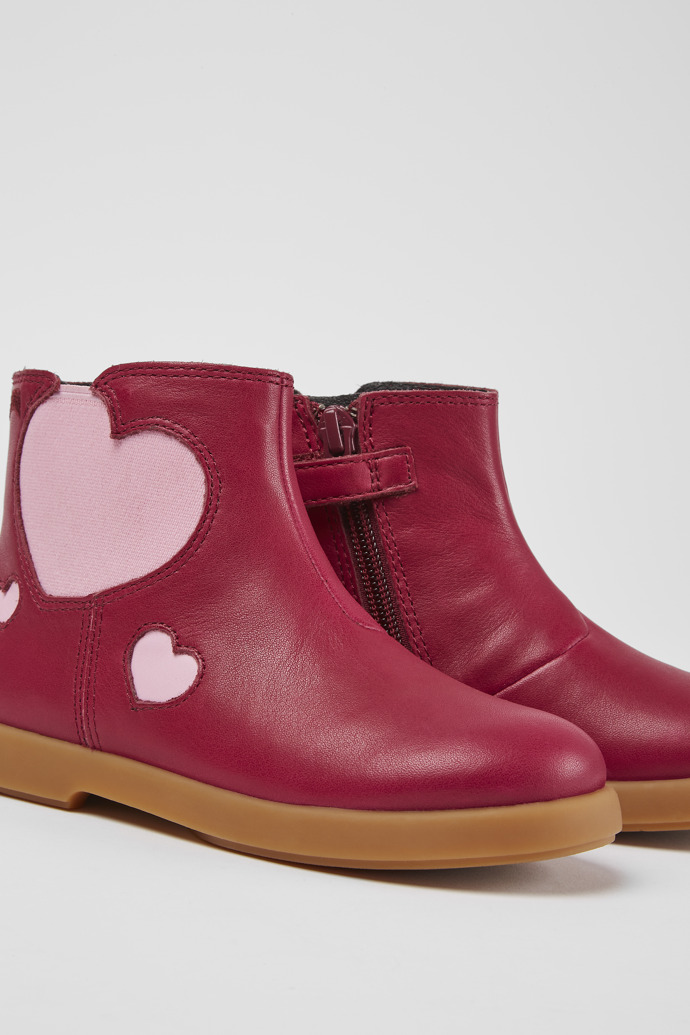 Close-up view of Duet Pink leather ankle boots