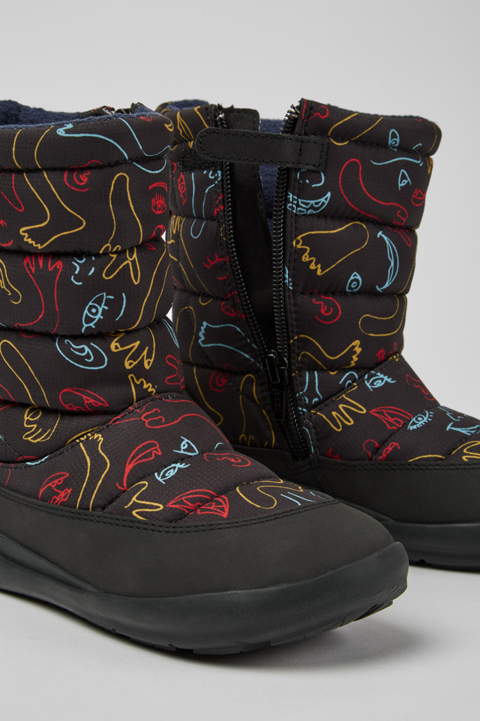 Close-up view of Ergo Black boots