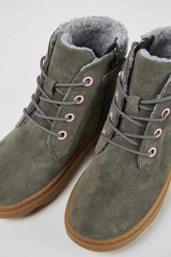 Close-up view of Kido Dark green ankle boots