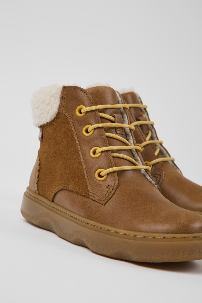 Close-up view of Kido Brown leather boots