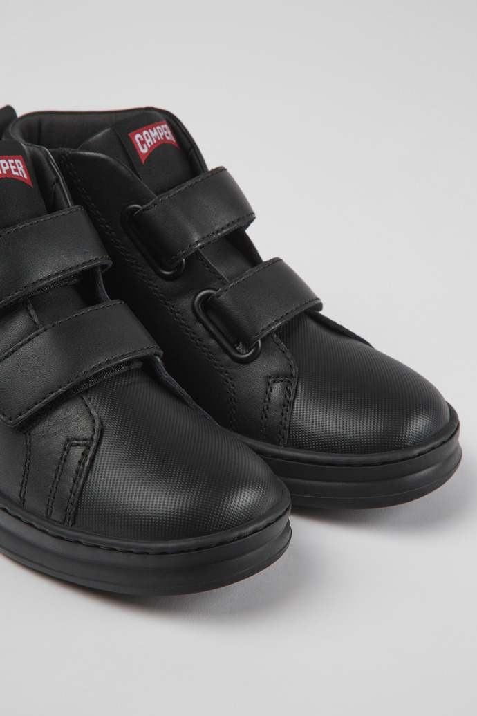 Close-up view of Runner Black leather and textile ankle boots for kids