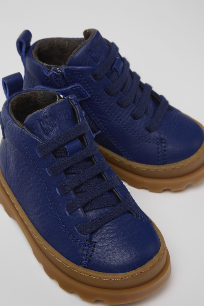 Close-up view of Brutus Blue leather lace-up boots