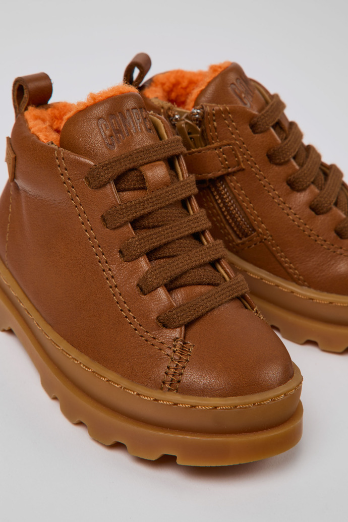 Close-up view of Brutus Brown leather lace-up boots