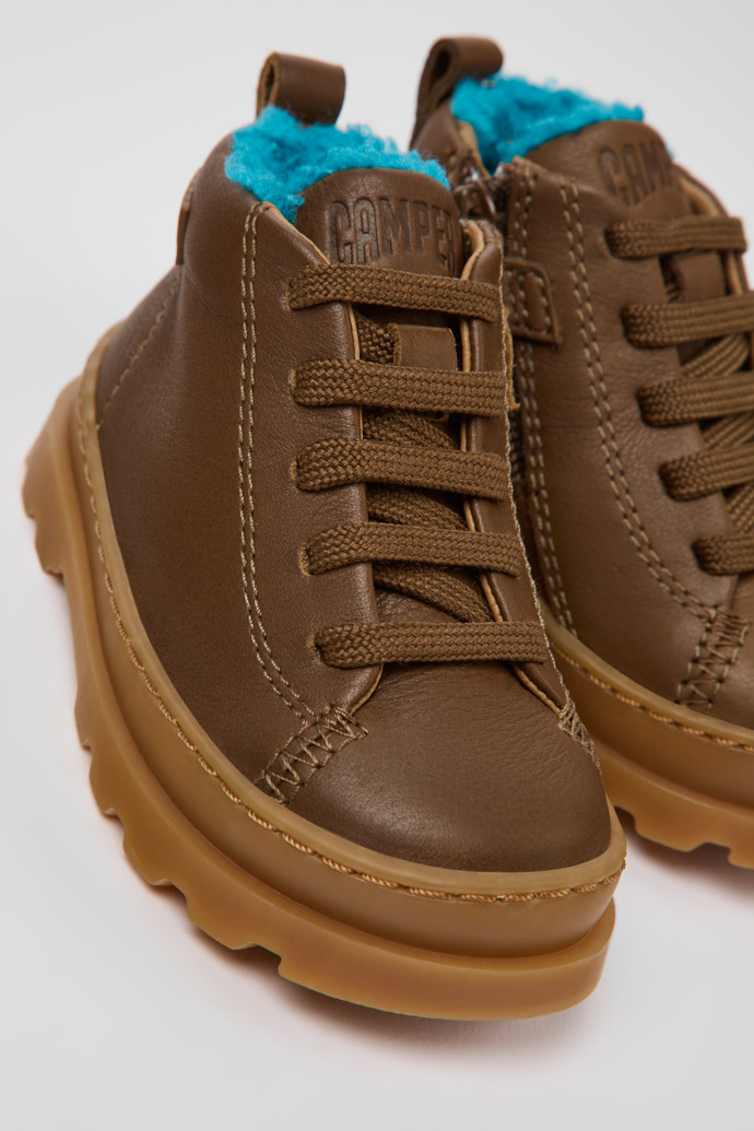 Close-up view of Brutus Brown leather ankle boots for kids