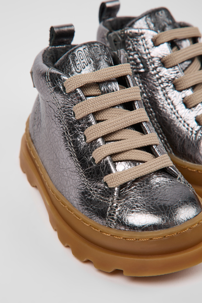 Close-up view of Brutus Metallic gray leather ankle boots for kids