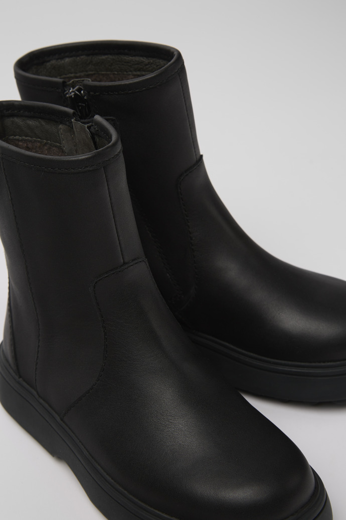 Close-up view of Norte Black leather boots