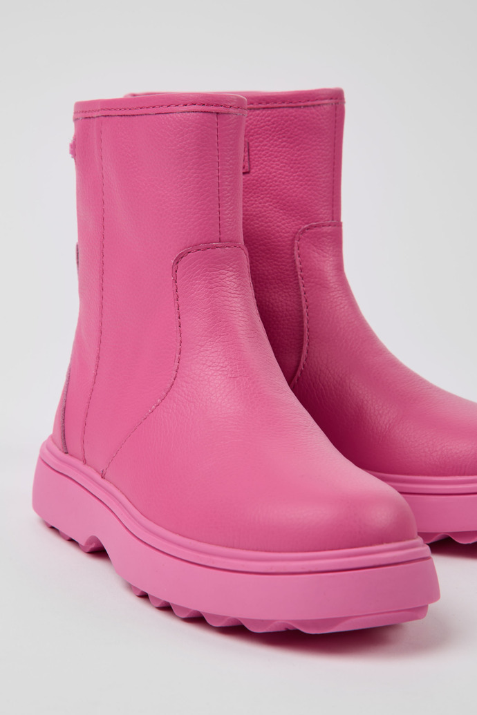 Close-up view of Norte Pink leather boots