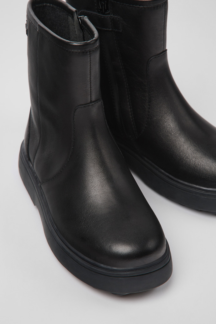 Close-up view of Norte Black leather ankle boots for kids