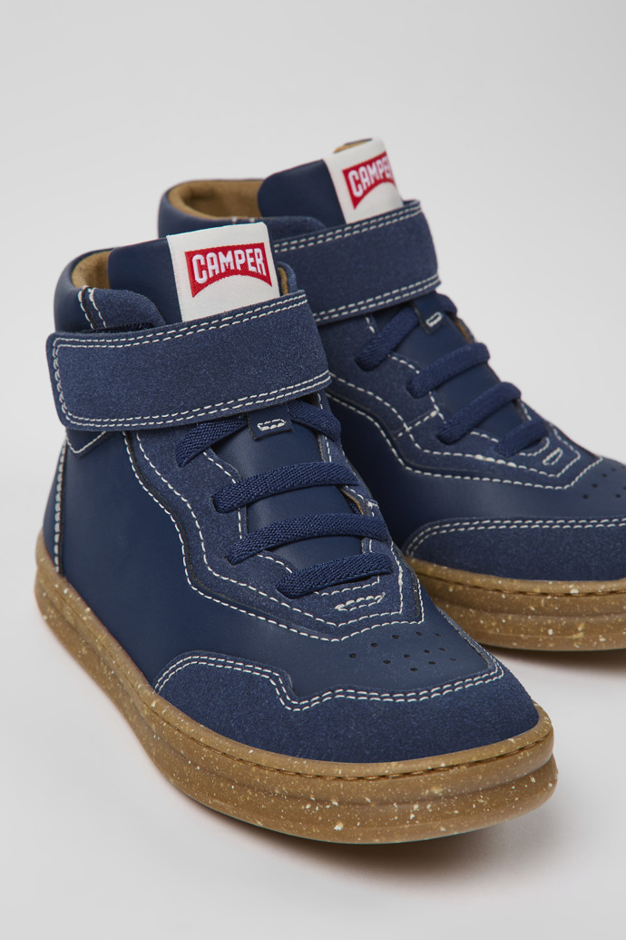 Close-up view of Runner Dark blue leather and nubuck ankle boots for kids