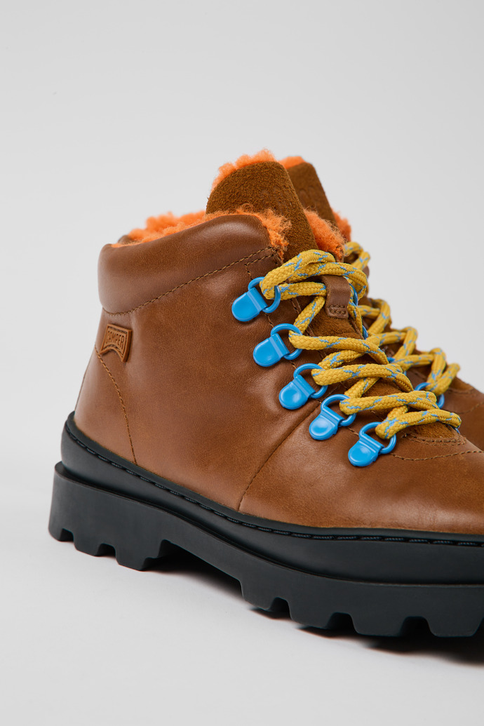 Close-up view of Brutus Brown leather and nubuck lace-up boots