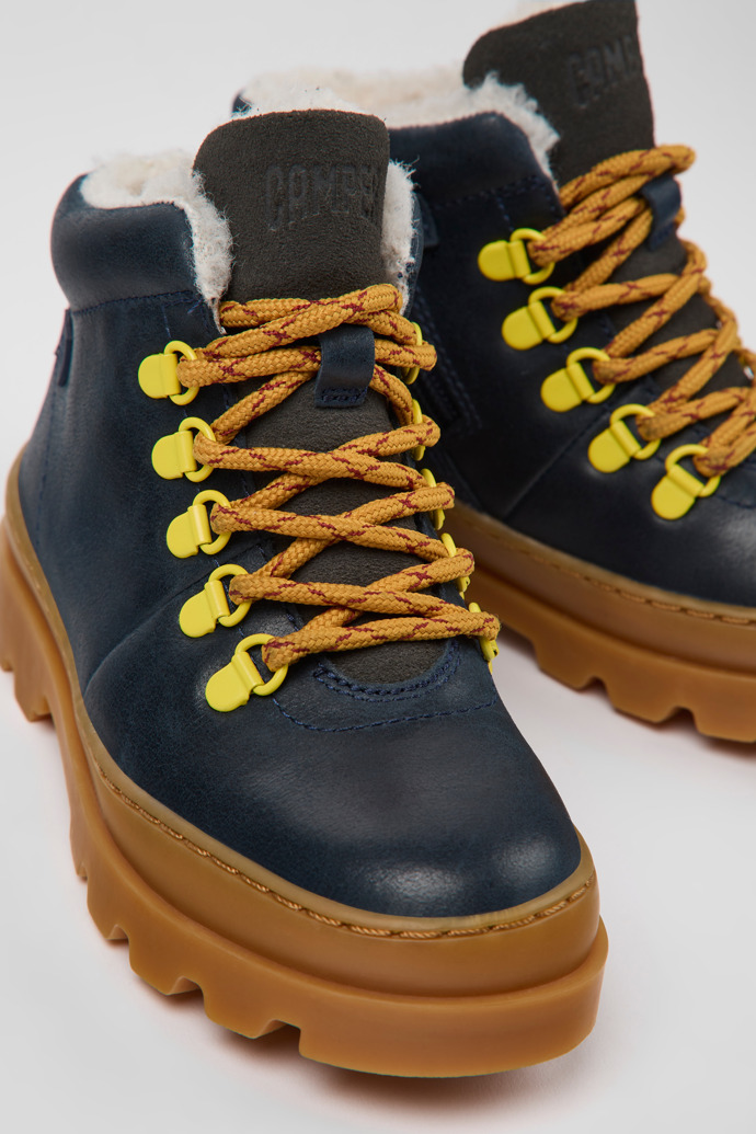 Close-up view of Brutus Navy blue leather and nubuck ankle boots for kids