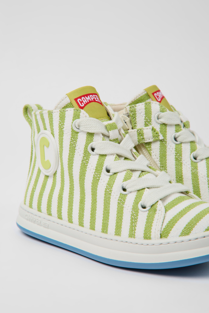 Close-up view of Runner Green and white textile sneakers for kids