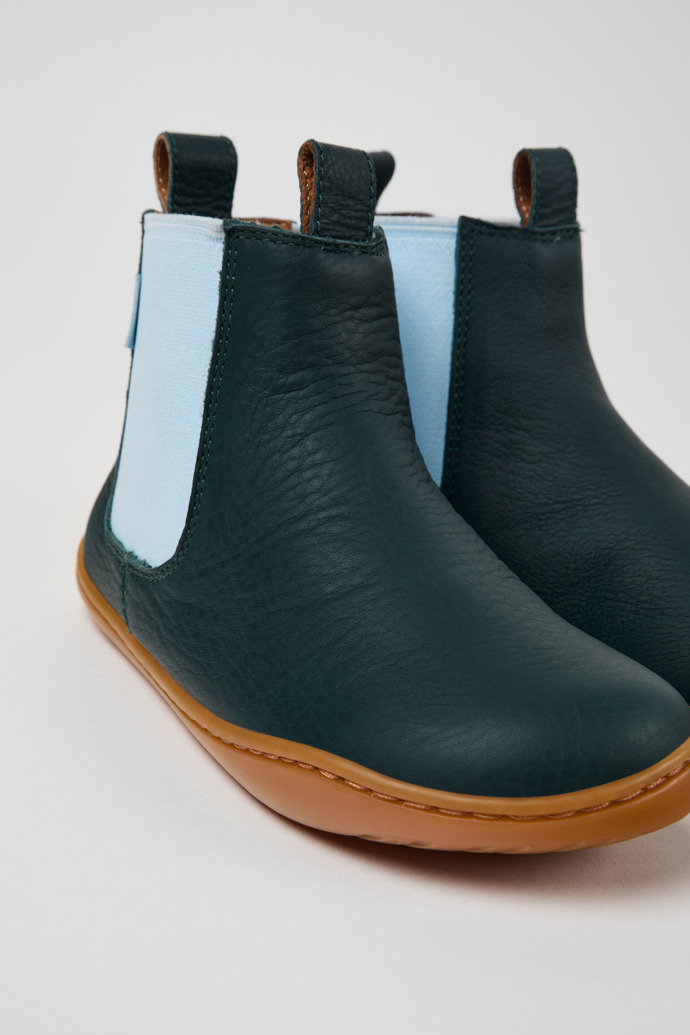 Close-up view of Peu Green leather ankle boots for kids