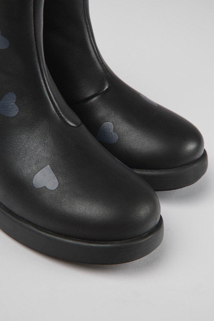 Close-up view of Twins Black leather ankle boots for kids