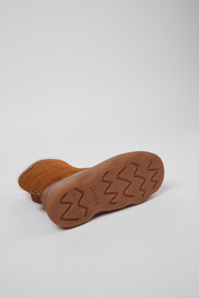 The soles of Kiddo Brown leather and nubuck boots for kids