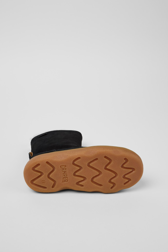 The soles of Kiddo Black Nubuck Mid Boots for Kids.
