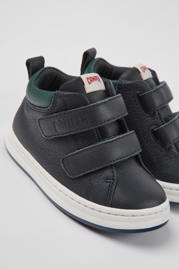 Close-up view of Runner Navy blue leather sneakers for kids