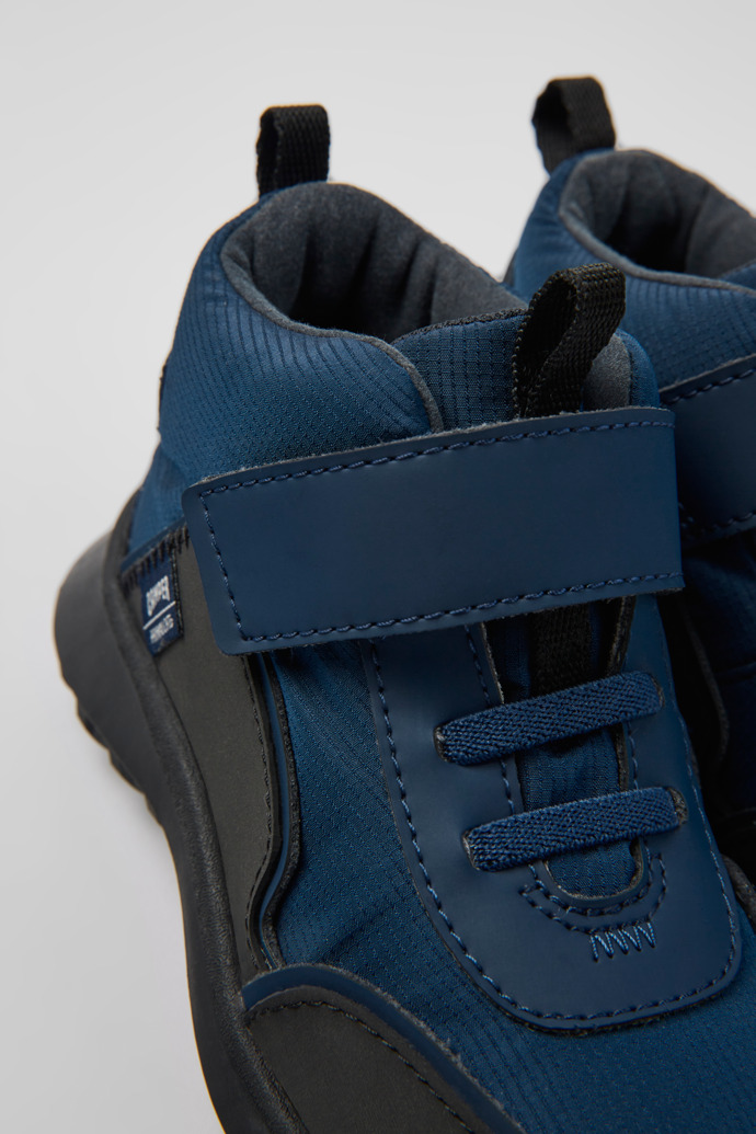Close-up view of CRCLR Dark blue textile and leather ankle boots for kids