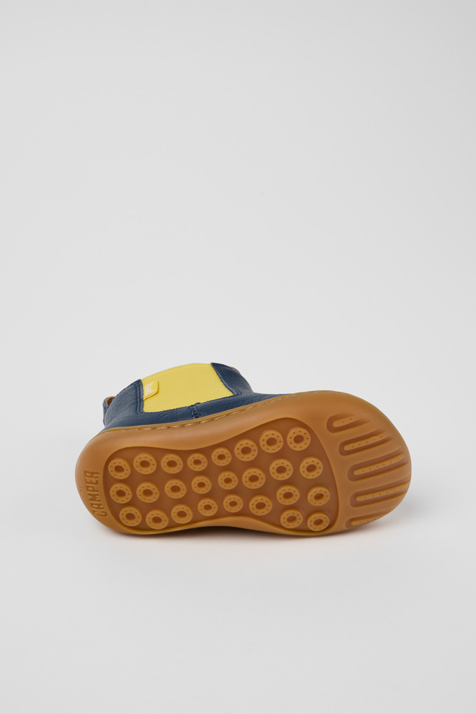 The soles of Twins Blue Leather Ankle Boots for Kids.
