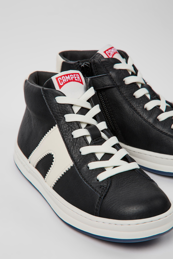 Close-up view of Runner Black and white leather sneakers for kids