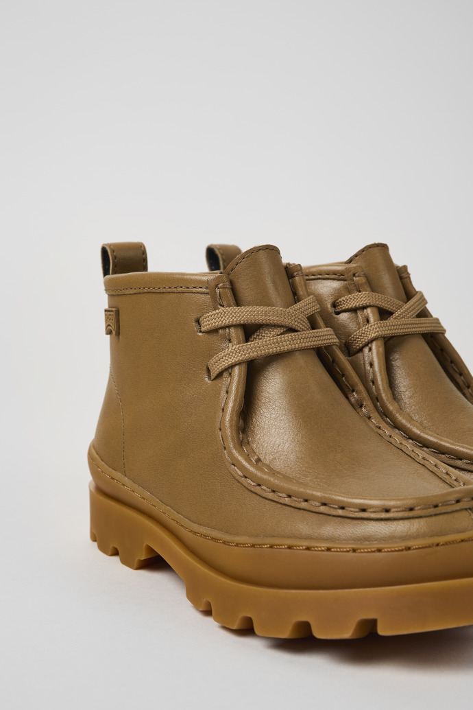 Close-up view of Brutus Brown leather ankle boots for kids