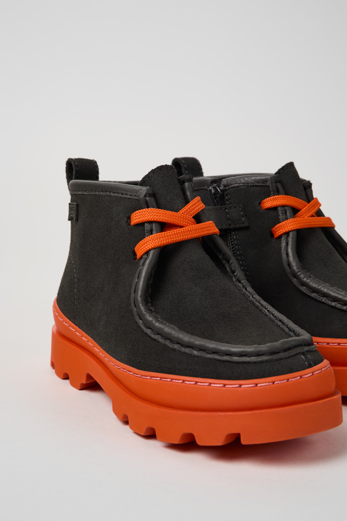 Close-up view of Brutus Grey leather and nubuck ankle boots for kids