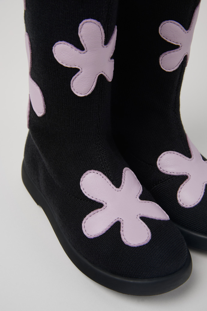 Close-up view of Duet Black and purple TENCEL™ Lyocell/leather boots