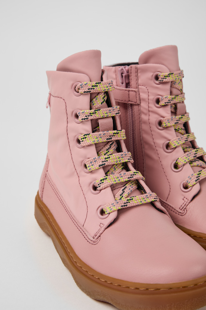 Close-up view of Kiddo Pink leather and textile ankle boots for kids