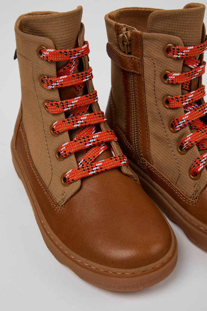 Close-up view of Kiddo Brown leather and textile ankle boots for kids