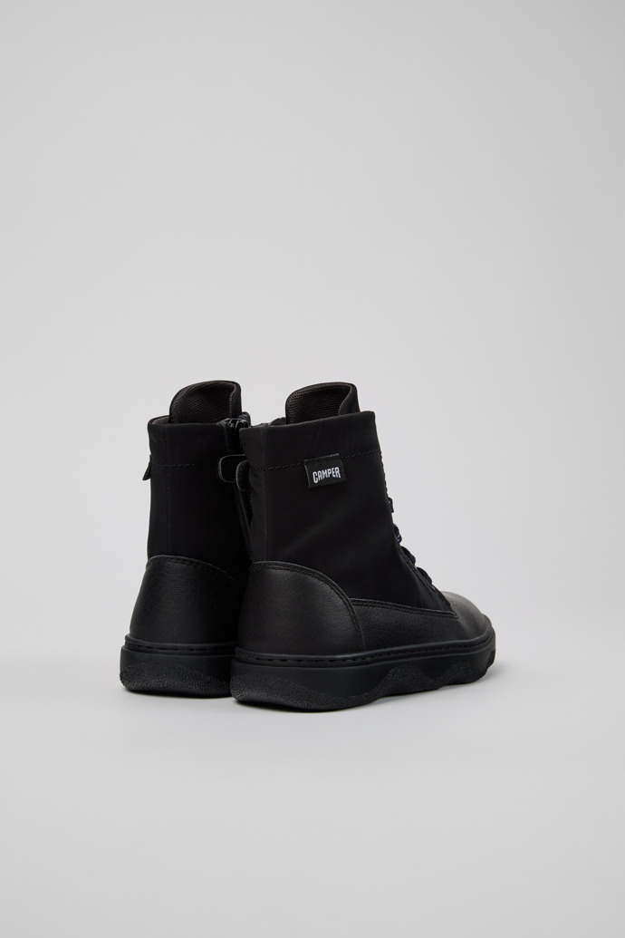 Kiddo Botines negros de tejido y piel para niños.