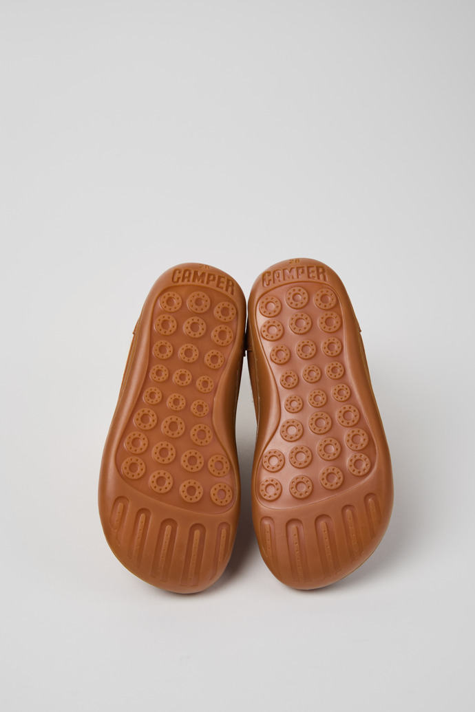 The soles of Peu Brown nubuck boots for kids