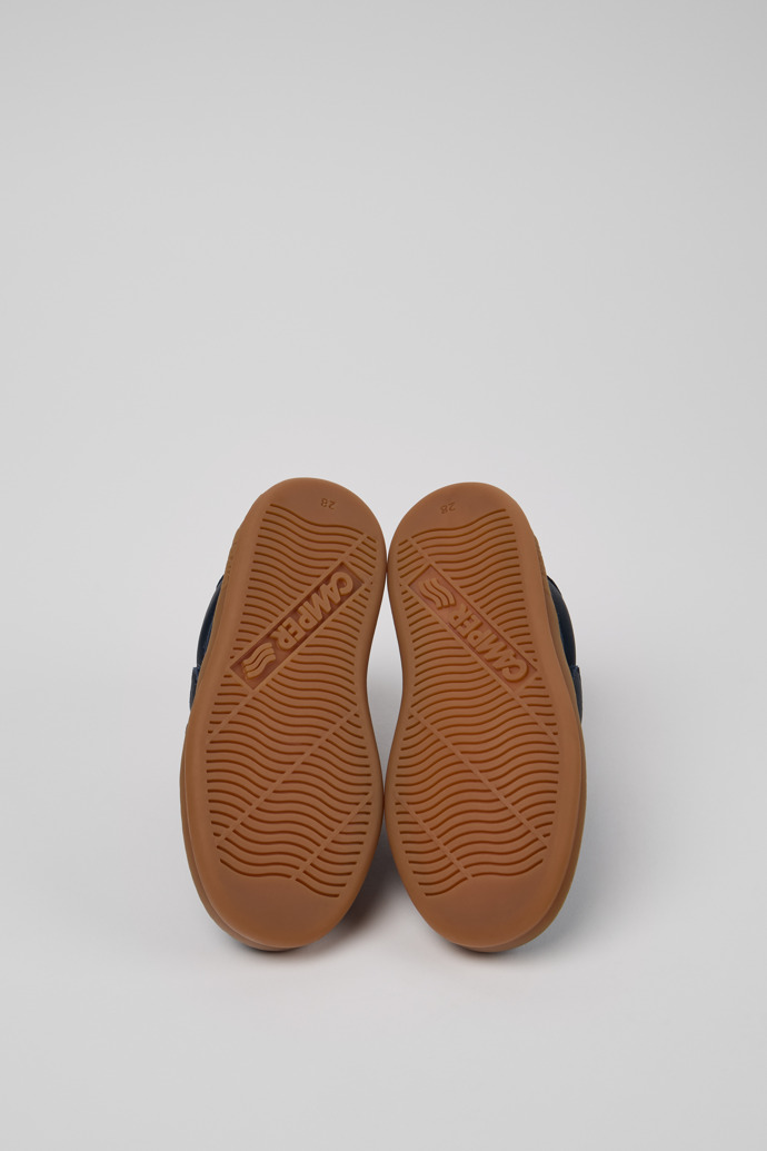 The soles of Runner Blue Leather Sneaker Booties for Kids.