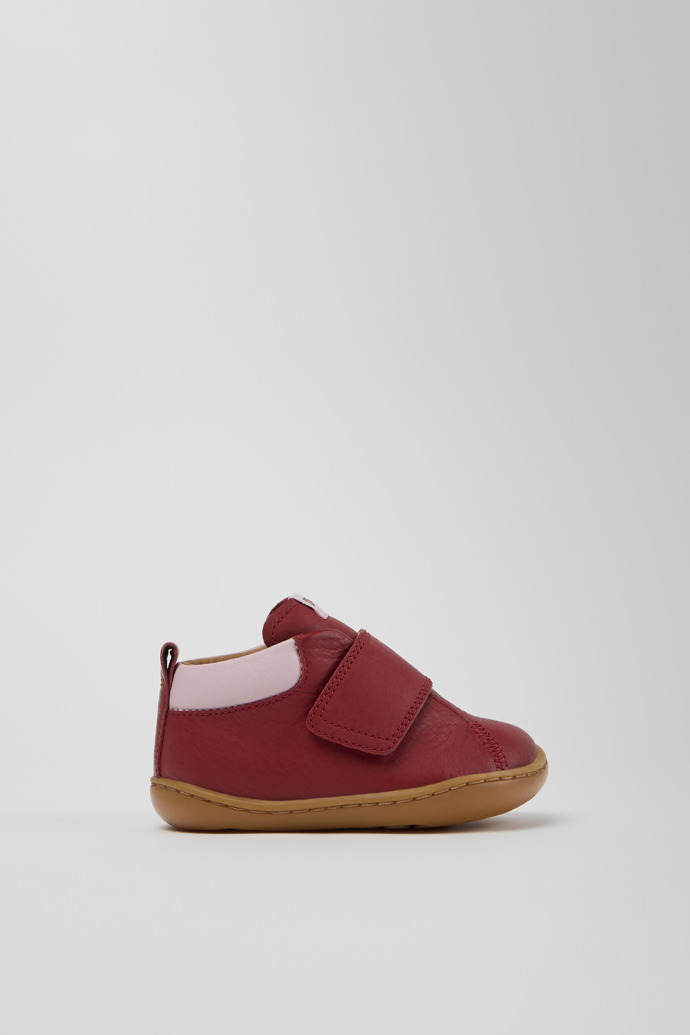 Side view of Peu Burgundy and Pink Leather Ankle Boots for Children.