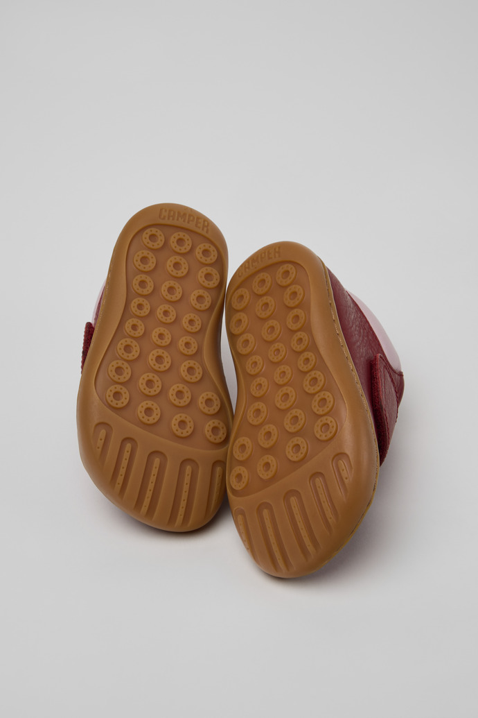 The soles of Peu Burgundy and Pink Leather Ankle Boots for Children.