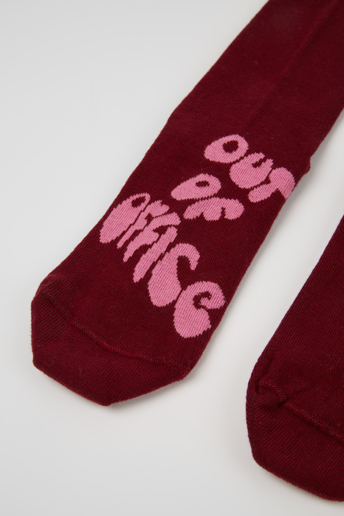 Close-up view of Out of Office Burgundy and pink socks