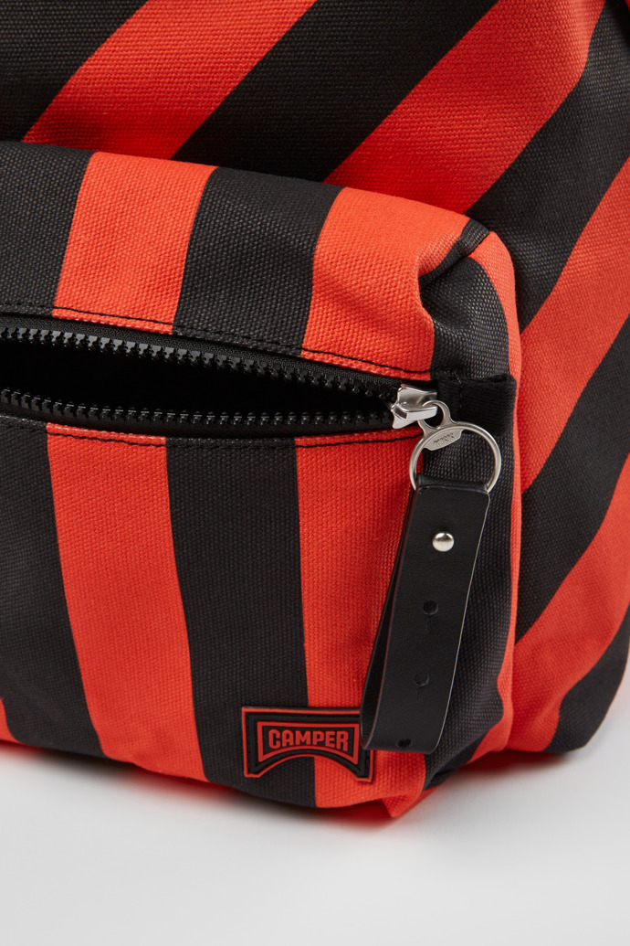 Close-up view of Ado Large black and red recycled cotton backpack