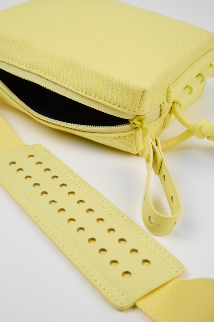Overhead view of Ado Yellow cross-body bag