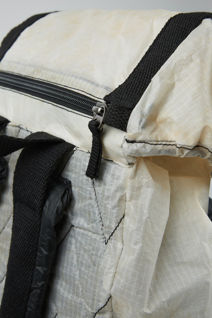 Close-up view of Camper x North Sails Black and white backpack