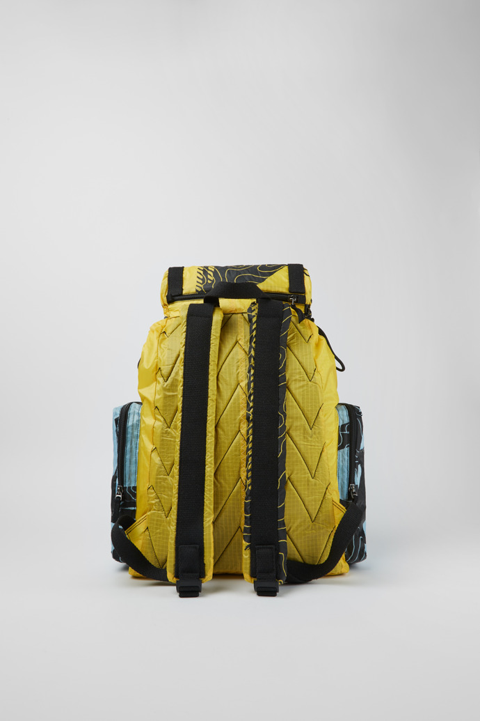 Back view of Camper x North Sails Yellow, black, and blue backpack