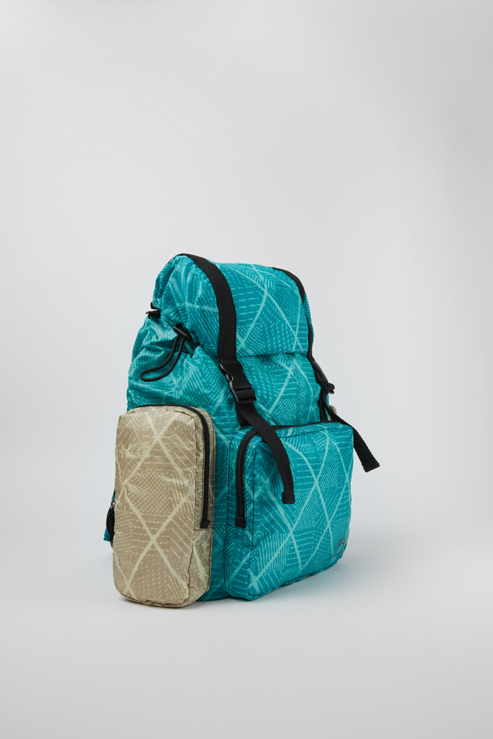 Front view of Camper x North Sails Turquoise and beige-green backpack