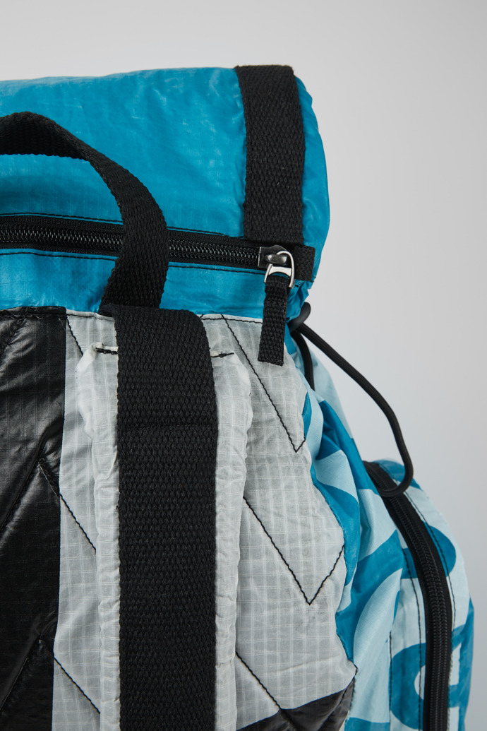 Close-up view of Camper x North Sails Blue and white backpack