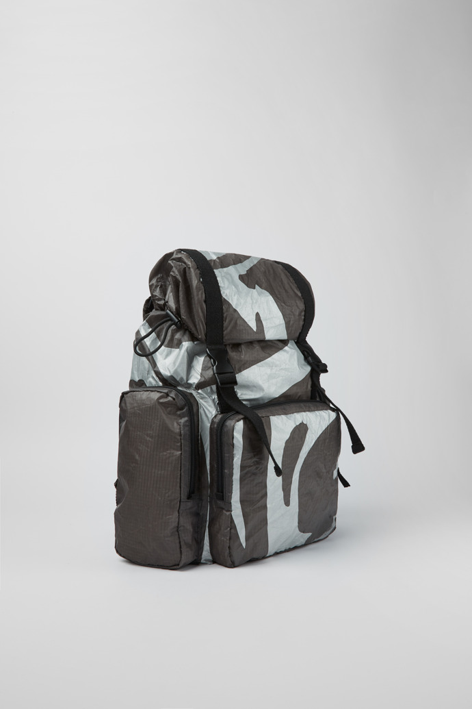 Front view of Camper x North Sails Green, gray, and silver backpack