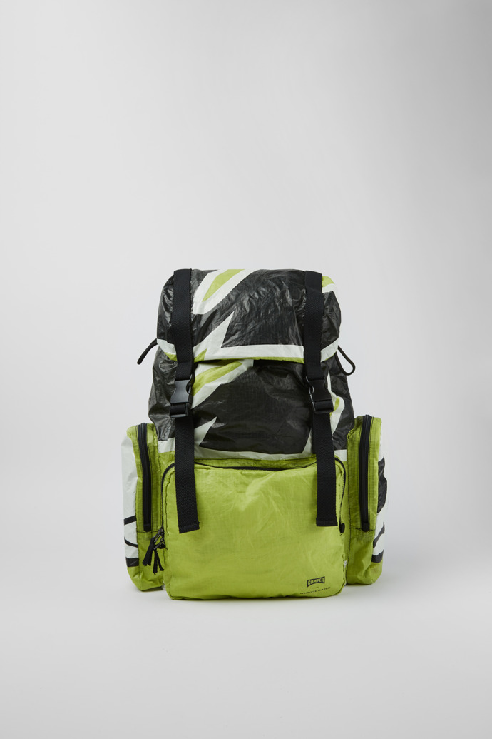Side view of Camper x North Sails Green, black, and white backpack