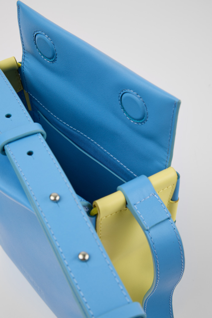 Close-up view of Tie Bags Blue and yellow crossbody bag
