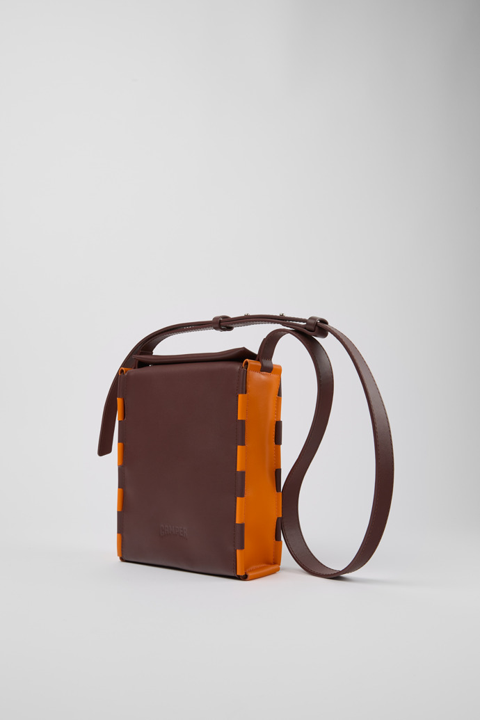 Front view of Tie Bags Burgundy and orange crossbody bag
