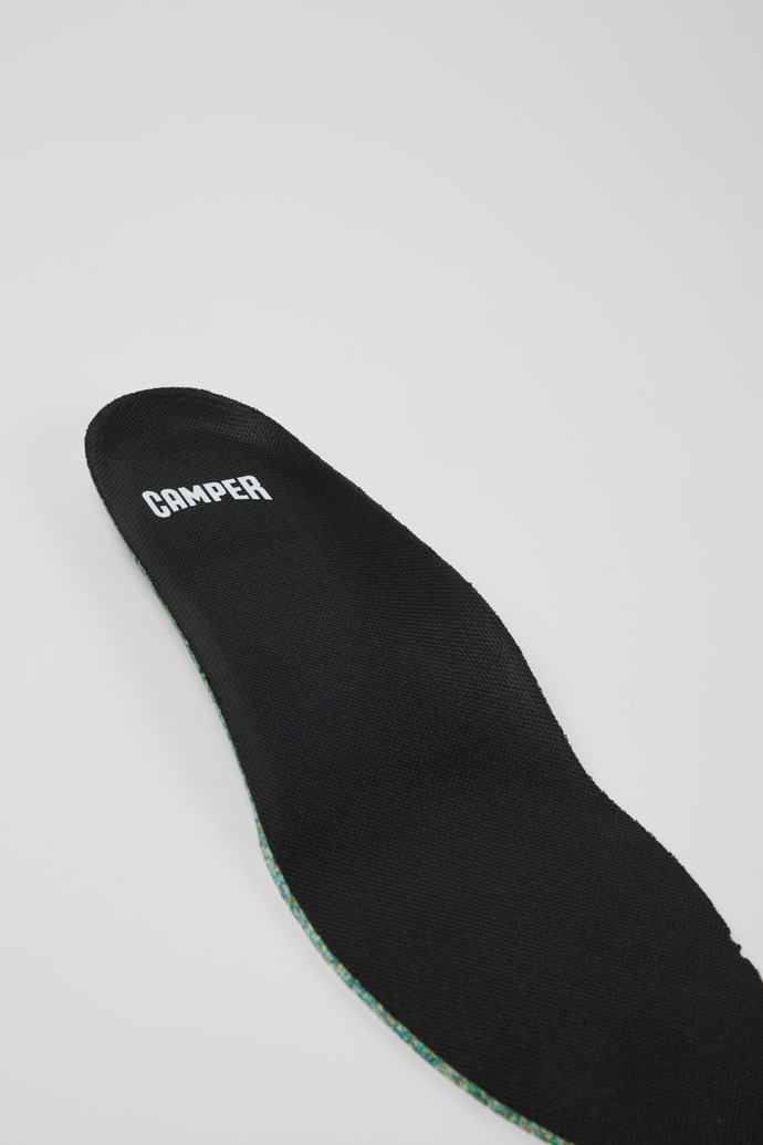 Close-up view of ACCESORIOS Black OrthoLite® Recycled Footbeds